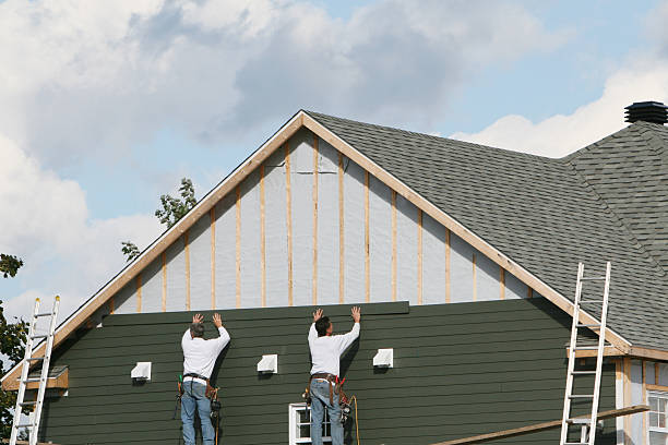 Professional Siding technician working in Preston, MD